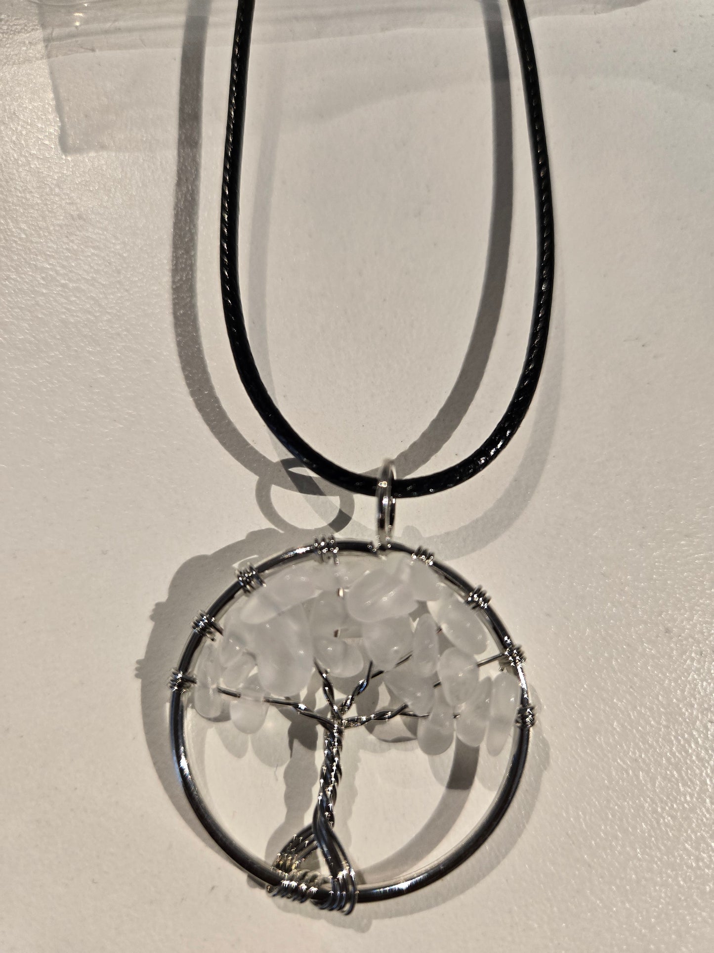 wrapped bead circle with blk cord necklace